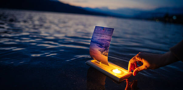 Wunschschiffchen am Millstätter See im Advent